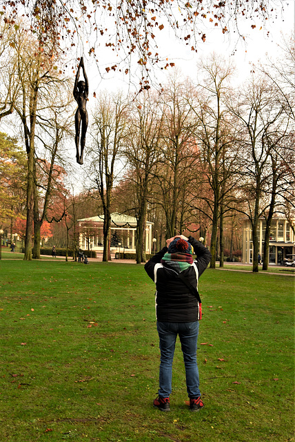 Photographing a black girl strung up from a tree.