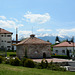 Bulgaria, Banya, Cityscape and Landscape of the Pirin Mountains in the Background