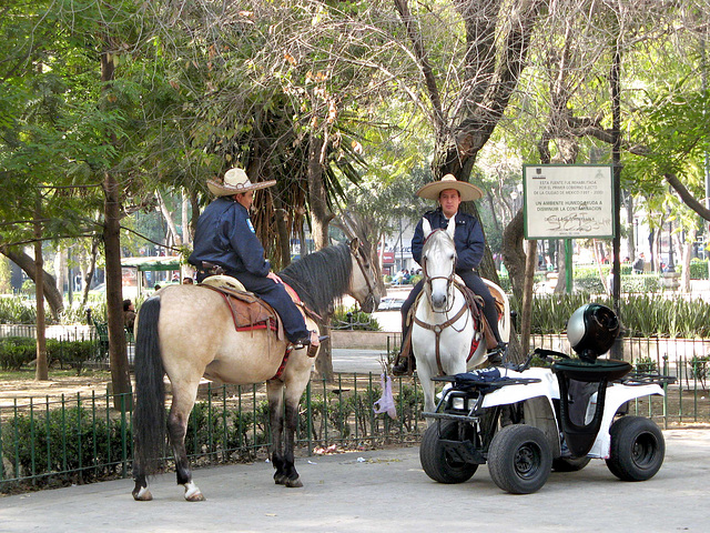 Our Alien helping the Mexican police on a scooter.