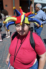 A local woman brought her own colorful headgear