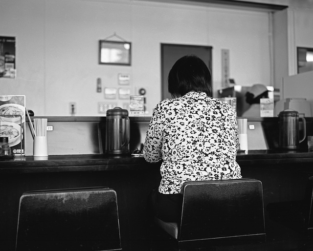 Woman in a patterned blouse