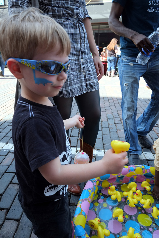 Henry, age 4, was drawn to a floating ducks game