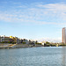 El barrio de Triana (Sevilla). El río Guadalquivir y el puente de Triana, la torre Sevilla y un  galeón.