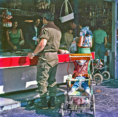 Dad buying goodies for his baby. - Israel