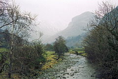 Looking towards Eagle Crag along Stonethwaite Beck from the bridge near Rosthwaite (Scan from Feb 1994)