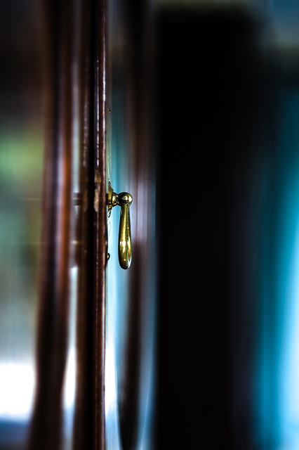 Handle vs. Blue Curtains