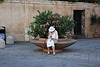 Lady sitting on a stone bench  HBM!