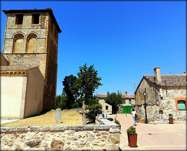 Sotosalbos, Segovia Province, incredibly blue sky! And, again, she spotted the camera!!! The church tower is known locally as the Leaning Tower of Sotosalbos!