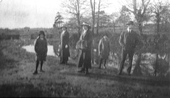 Marjory & Phyllis by the lake with older family members c1912
