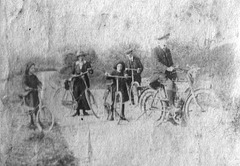 Marjory & Phyllis with bicycles & older family members c1912