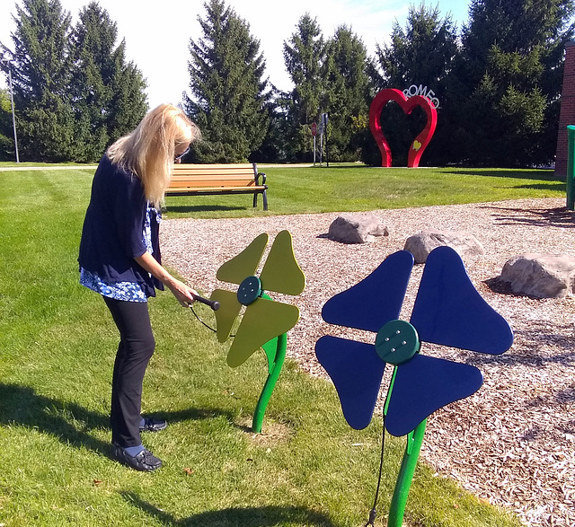 My stepdaughter and I at the local library playground