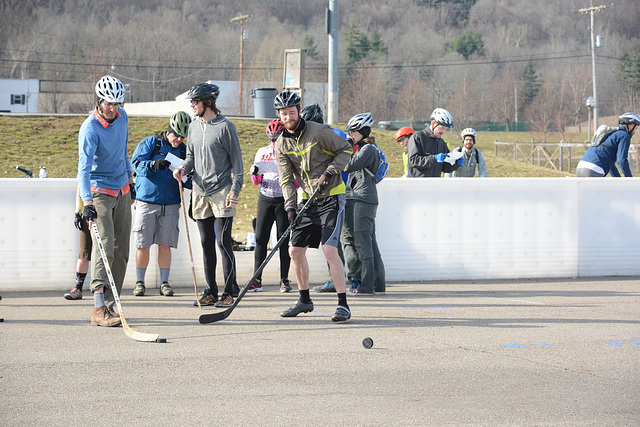 Bicyclist hockey on concrete