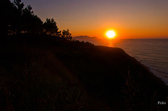 Puesta de sol sobre el mar Cantábrico + (2 notas)