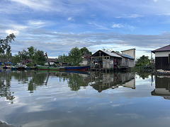 Black river, Balikpapan. Fishermen houses.