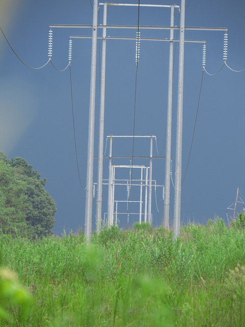 Power-line & approaching thunderstorm