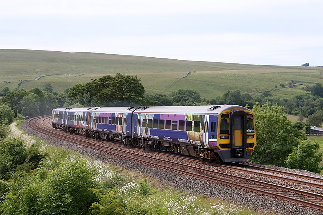 Northern Rail class 158 N0.158 849 leads 2H93 14.50 Carlisle - Leeds service at Smardale 23rd June 2018