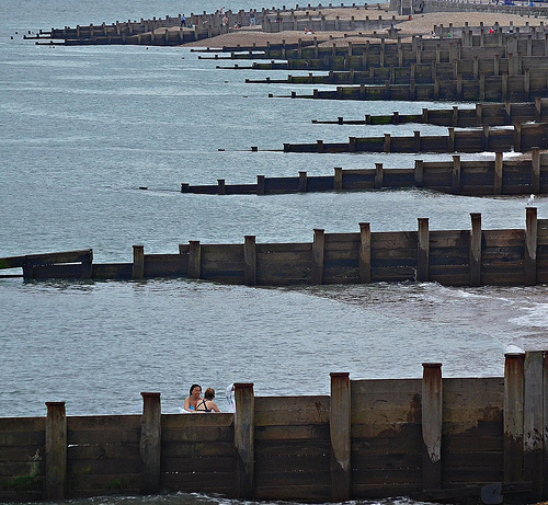 Bathing by the groynes