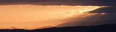 Cloud bank hides the sunset