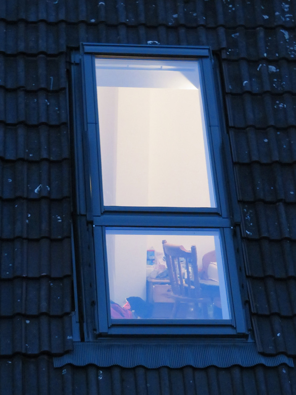 Behind the window