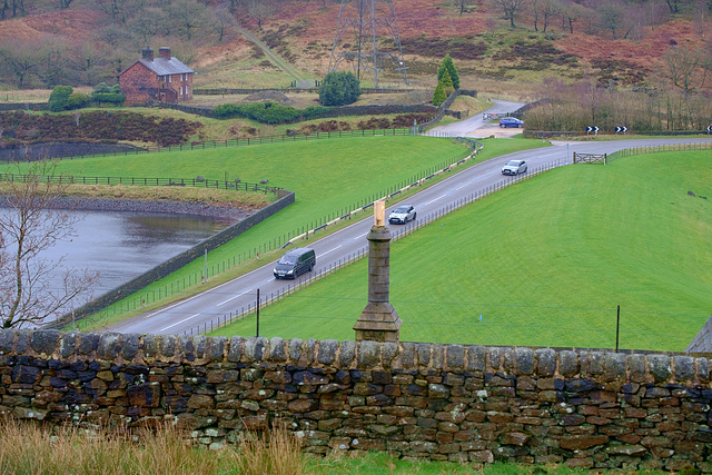 cars over Woodhead Dam