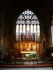 High-altar and stained glass window.
