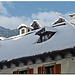 Roof with snow and sun