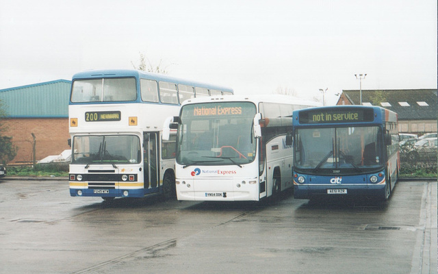 Burtons Coaches F245 MTW, YN54 DDK with Stagecoach Cambus AE51 RZR at Dept Road, Newmarket - 4 April 2005 (542-23A)