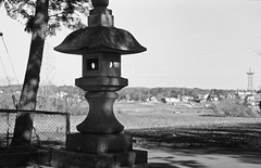 Stone lantern in a rural landscape