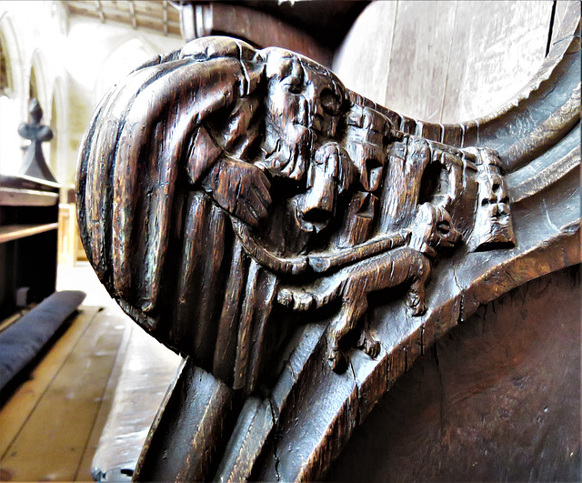 boston church,lincs (36) c14 stall elbow beggar and dog