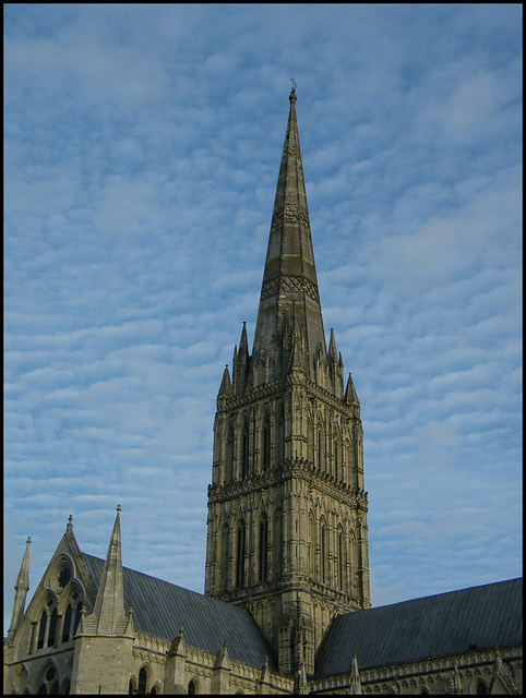 spire in a dappled blue sky