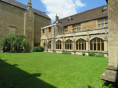 lacock abbey, wilts (75) c15 north walk with c16 windows in the brown gallery above