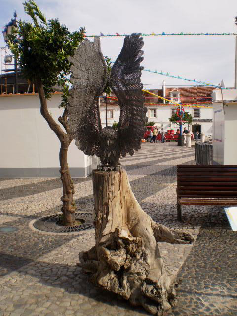 Sculpture of little owl.