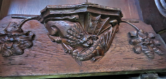 boston church,lincs (83)c14 misericord lion and dragon