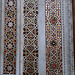Mosaic panels around a doorway