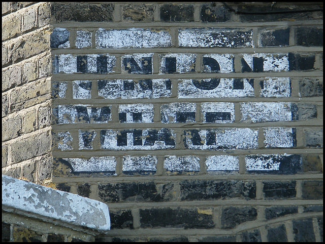 Union Wharf ghost sign