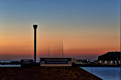 Old Moon rise at sunrise, Weymouth