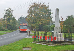 DSCF0091 Mulleys Motorways YN54 NXK passing the War Memorial in Worlington - 19 Oct 2017