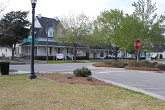 Well kept "islands" around the corners of the city park.  also, a lovely older home on a lovely street of same type style.