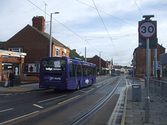 DSCF5388 Trent Barton (trentbarton) FJ58 KJZ following a NET tram in Chilwell - 25 Sep 2016