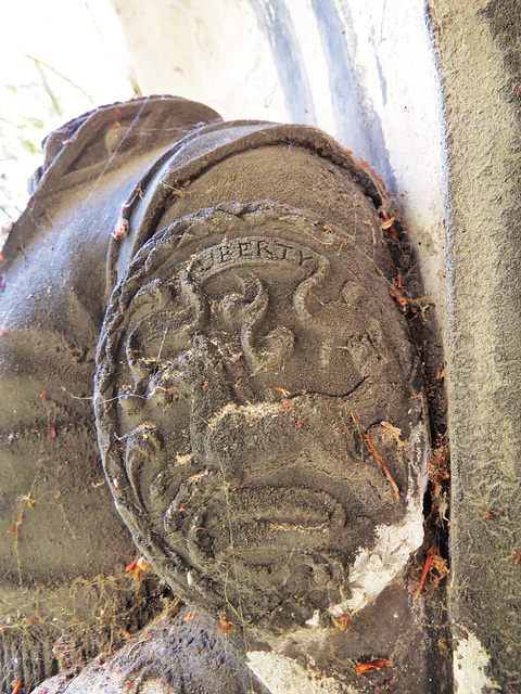 brompton cemetery, london,doggetts waterman coat and badge on  robert coombes tomb, +1860, champion thames sculler. the race dates from 1715, and the badge celebrates the accession of george I, showin