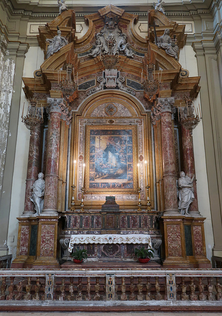 Ornate marble side altar