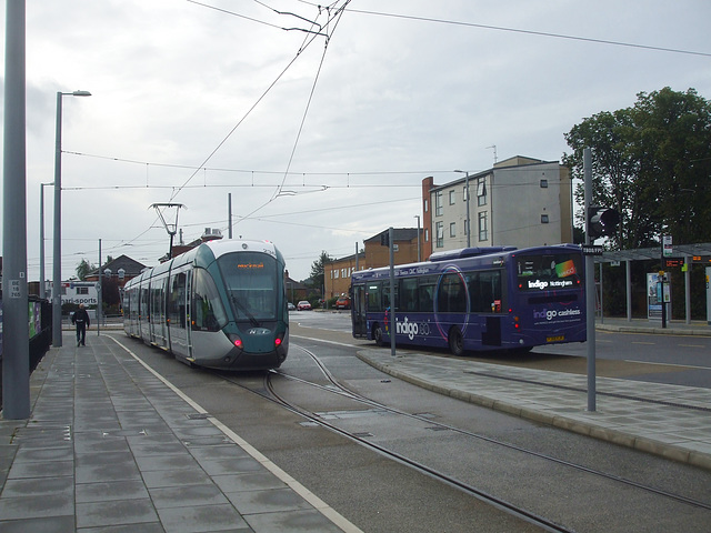 DSCF5289 Trent Barton (trentbarton) FJ58 KJK and NET tram 227 at Beeston - 25 Sep 2016