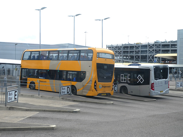 Stagecoach 10803 (SN66 WAE) and APCOA B3 (BX64 WHJ) at Luton Airport - 14 Apr 2023 (P1140952)