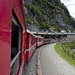 Bernina Red Train - On the coast of the Poschiavo Lake, Switzerland