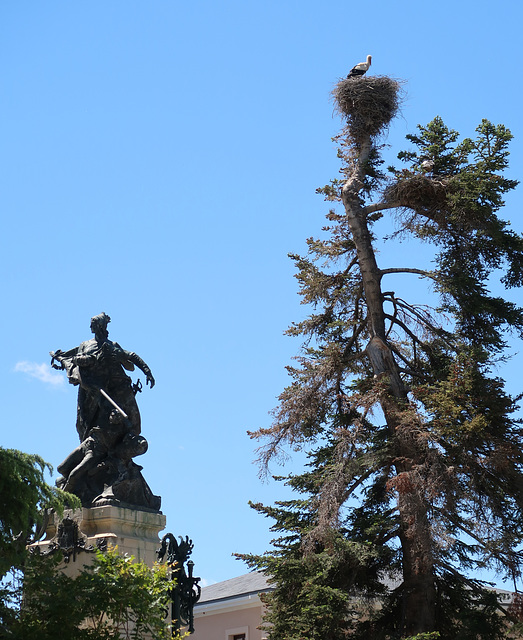 Statue and stork's nest