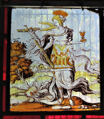 woodchurch church, kent (31)c17 flemish  glass showing a saint holding the host and a crucifix; perhaps st helen?