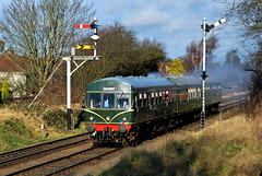 Diesel railcar leaves Loughborough.