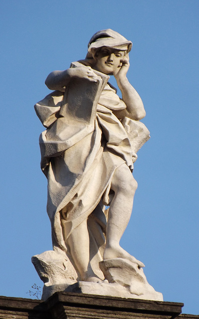 Sculpture of a Figure with a Book in Piazza Dante in Naples, June 2013