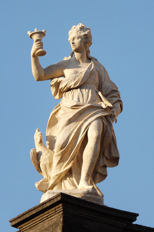 Sculpture of a Figure with a Chalice in Piazza Dante in Naples, June 2013