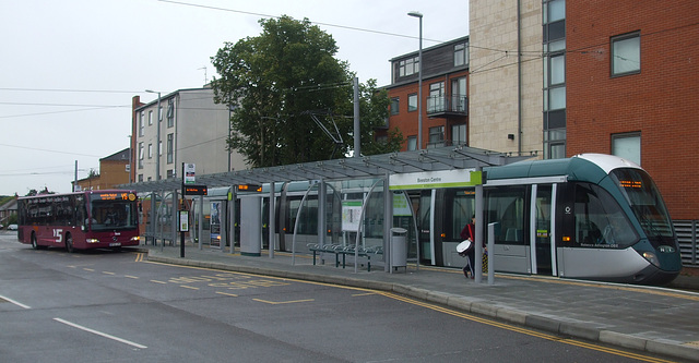 DSCF5265 Dunn Group (yourbus) BF62 JYS and NET tram 231 at Beeston - 25 Sep 2016